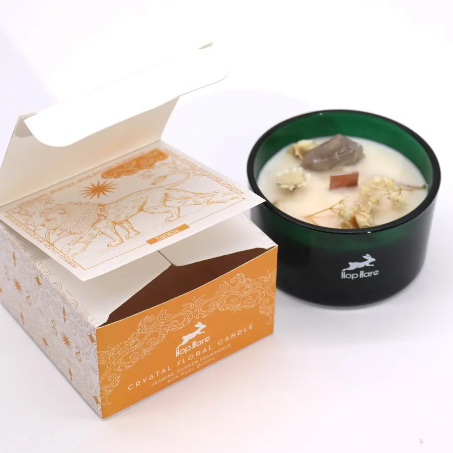 Świeca z kamieniami i kwiatami Lew